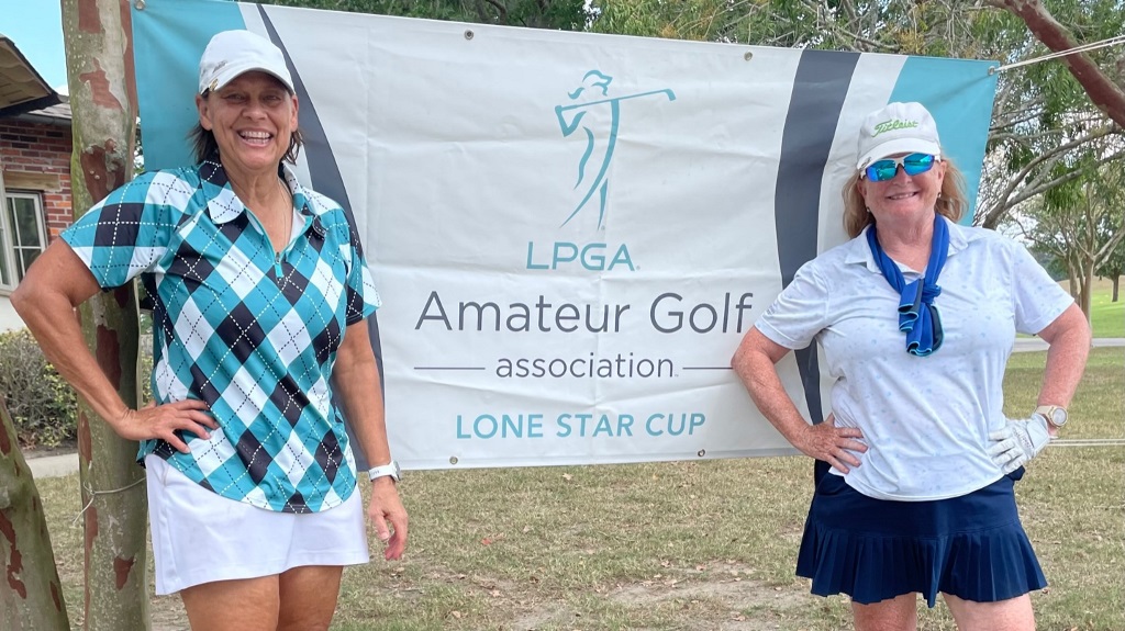Two female golfers posing for a picture before a golf tournament in Houston Texas