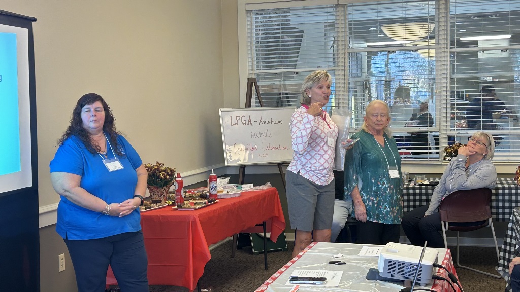 Presentation of Jeanne Musterman Volunteer Award to Linda Wells