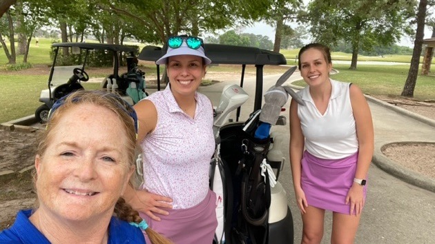 A group of female golfers taking a selfie before a round of golf at Gleannloch in Spring Texas