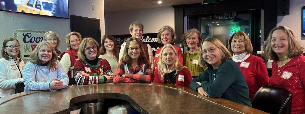 Women from the LPGA Amateurs Fox Cities Green Bay Chapter gather at a local pub during the Holidays in 2024.