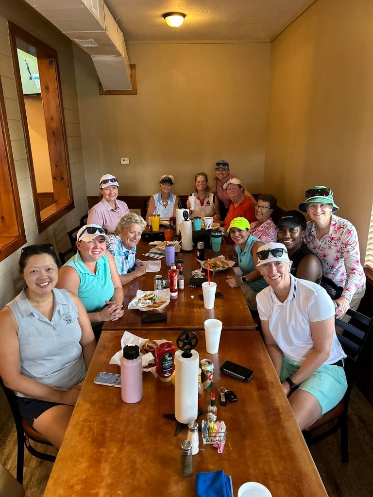 A group of female golfers having lunch after a round of golf in Houston Texas