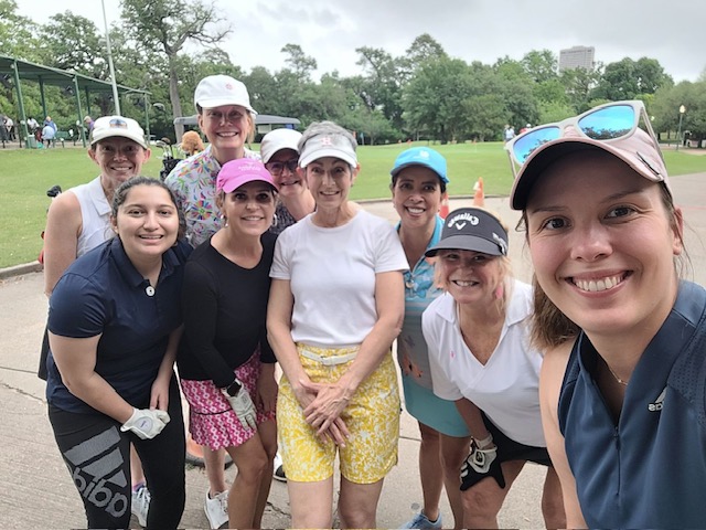 A group of women posing for a selfie before a round of golf in Houston Texas